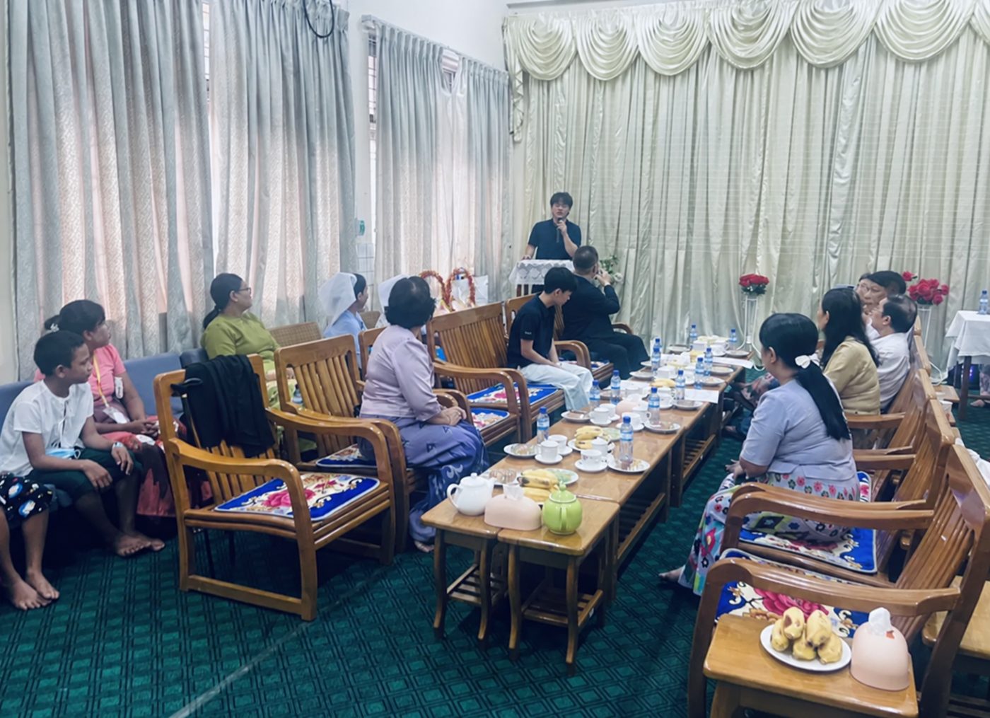 Giving a speech to families and hospital staff